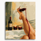 Spilled Desire: a raised foot holding a tilted wine glass as red wine spills down a leg beside a bathtub.