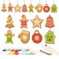 Set of Christmas-themed ceramic decorations with paint cans and brushes on a white background