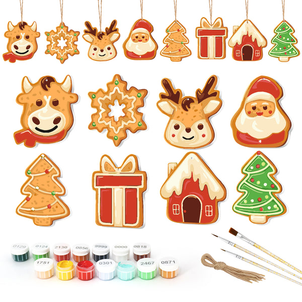 Set of Christmas-themed cookie cutters with paint supplies on a white background