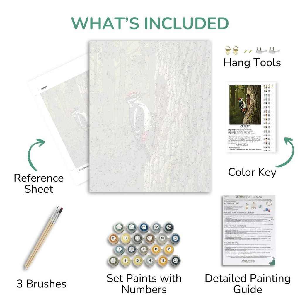 Forest Sentinel Woodpecker kit contents with canvas, paints, brushes, reference sheet and guide
