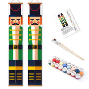 Two nutcracker-themed painting kits with paint and brushes on a white background