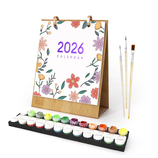 Floral 2026 calendar with paintbrushes and paint set on a white background