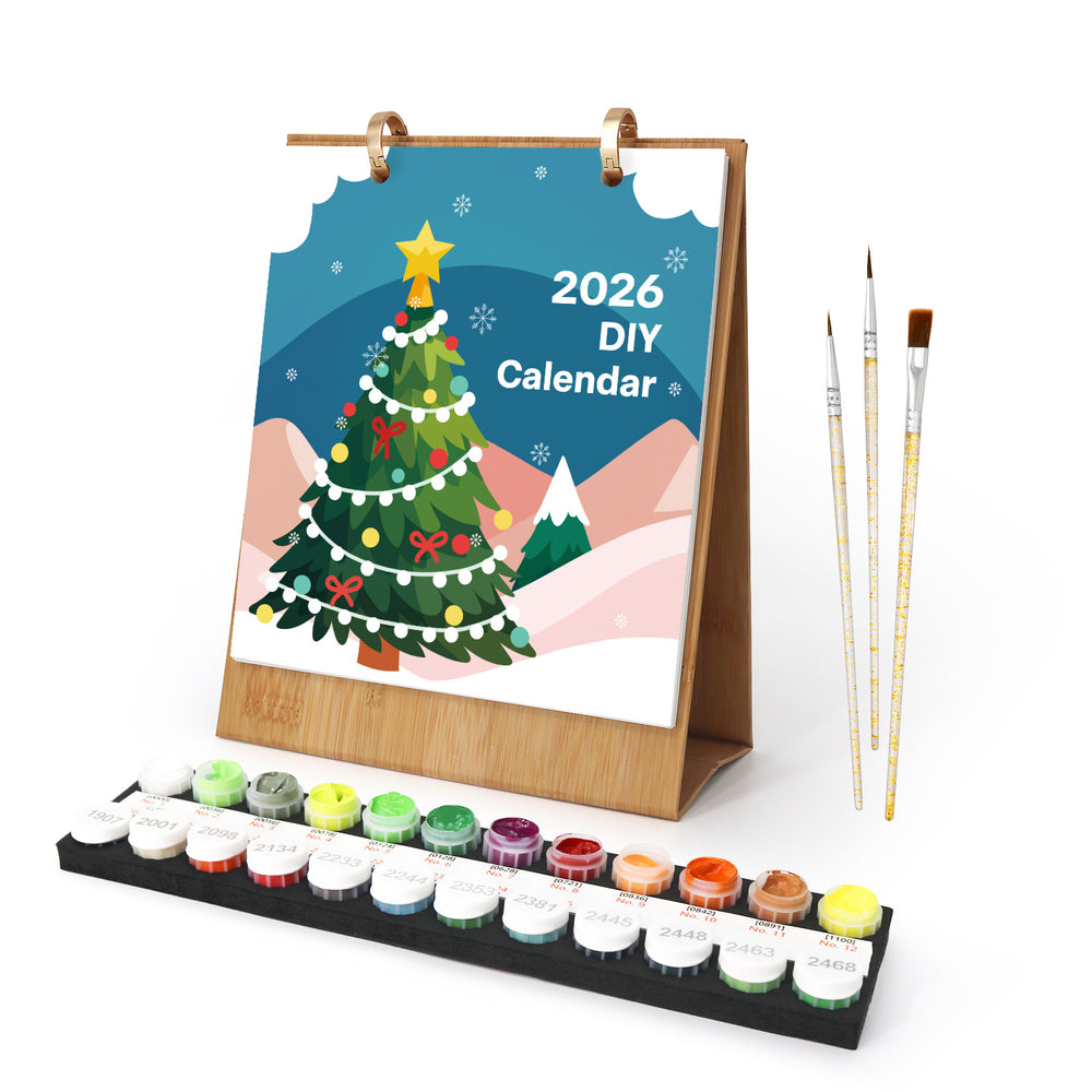 2026 DIY calendar with Christmas tree design, paint set, and brushes on a white background