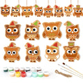 Set of owl ornaments with hats, paint cans, and brushes on a white background