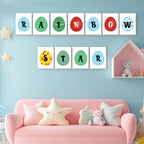 Children's room with a pink sofa, colorful letters on the wall, and toys.