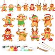 Set of gingerbread-themed Christmas ornaments with paint supplies on a white background