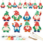 Set of colorful gnome ornaments with painting supplies on a white background