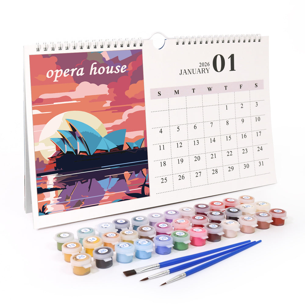 Calendar with 'opera house' design, paint pots, and brushes on a white background