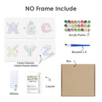 Artistic set with linen canvas, acrylic paints, brushes, and stickers on a white background.