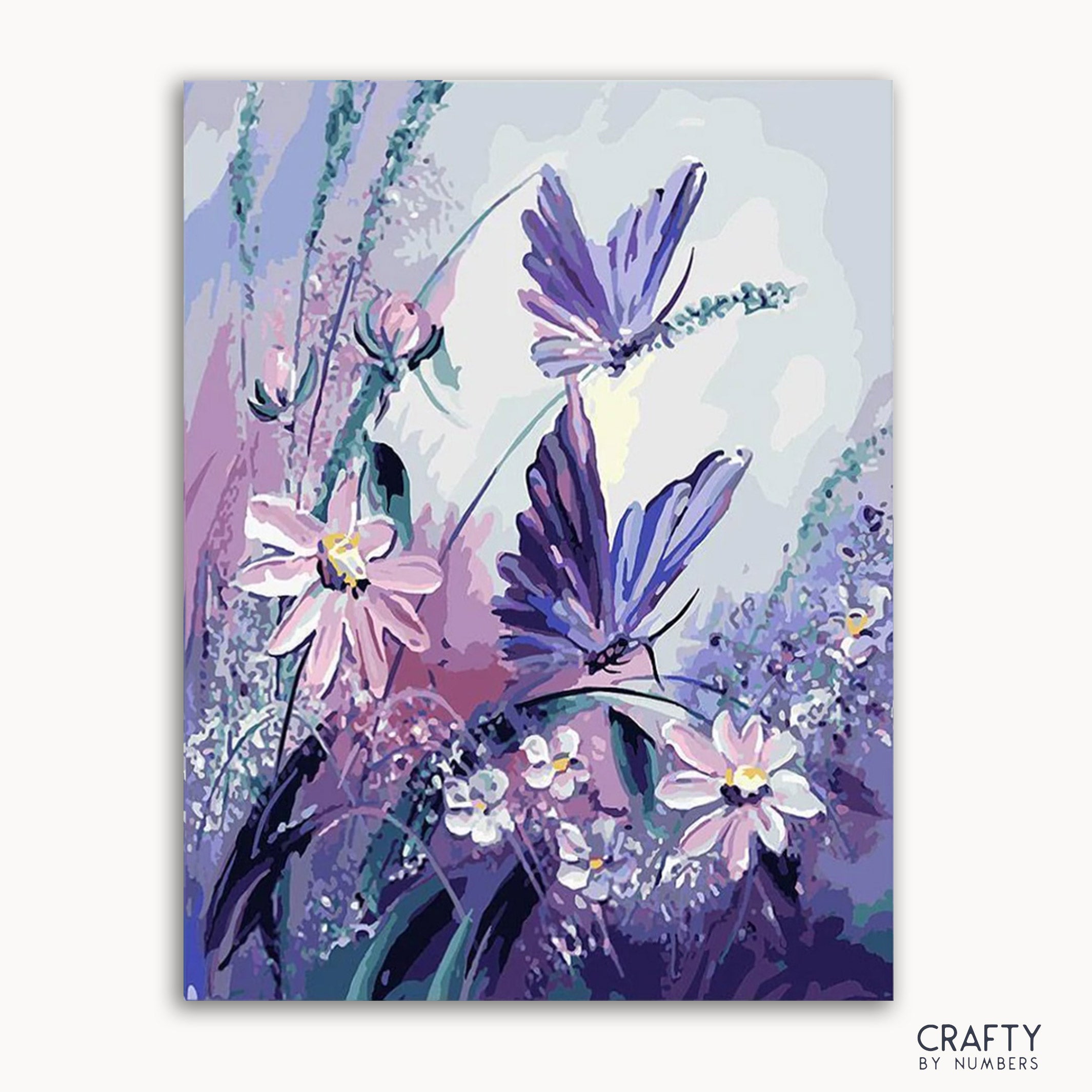 A canvas with a paint-by-numbers kit featuring a floral design with purple butterflies and various flowers.