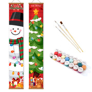 Two Christmas-themed vertical banners with a snowman and tree design, along with paint bottles and brushes on a white background.