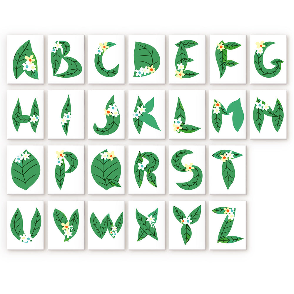 This kit features 26 mini canvases, each with a letter of the alphabet delicately designed with leafy forms and soft white blossoms, combining botanical beauty with the art of painting for a peaceful, creative experience.