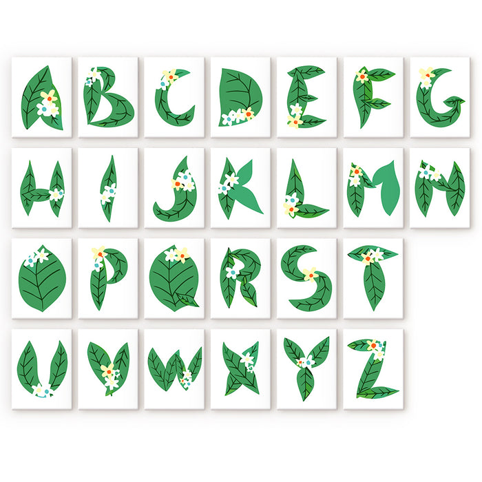 This kit features 26 mini canvases, each with a letter of the alphabet delicately designed with leafy forms and soft white blossoms, combining botanical beauty with the art of painting for a peaceful, creative experience.
