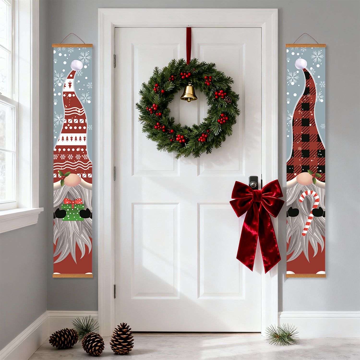Decorative Christmas door with wreath, gnomes, and bow on a white door.