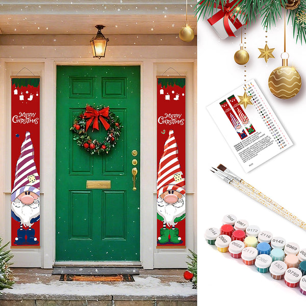 Christmas door decorations with gnomes and wreath, paint set, and paintbrushes.