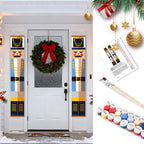 Decorative nutcracker panels with a wreath on a door, paint swatches, and paintbrushes.