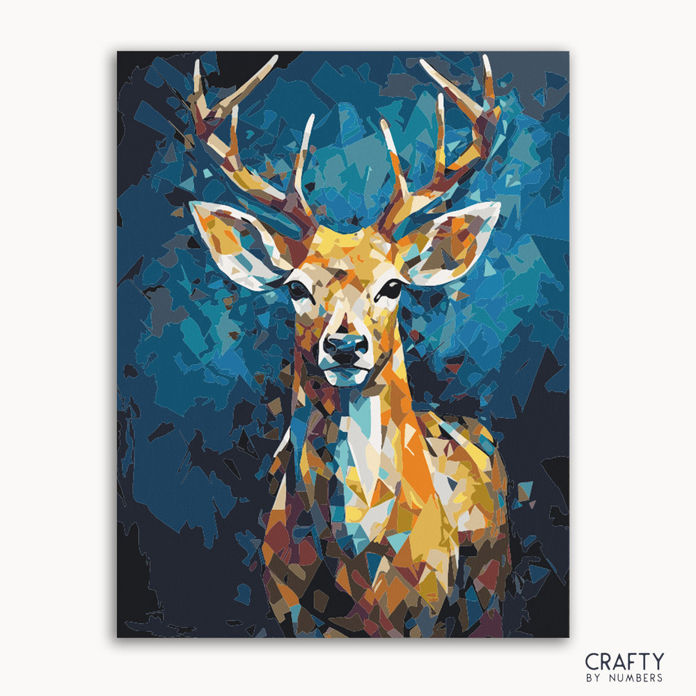 A paint by numbers kit depicting a prismatic deer with vibrant colors on a blue background, crafted by the brand Crafty by Numbers.