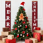Decorated Christmas tree with ornaments and presents, flanked by 'Merry Christmas' banners.