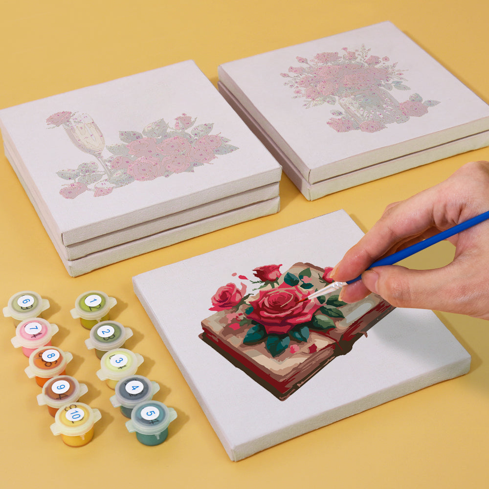 Close-up of a Timeless Roses paint by numbers canvas with numbered sections