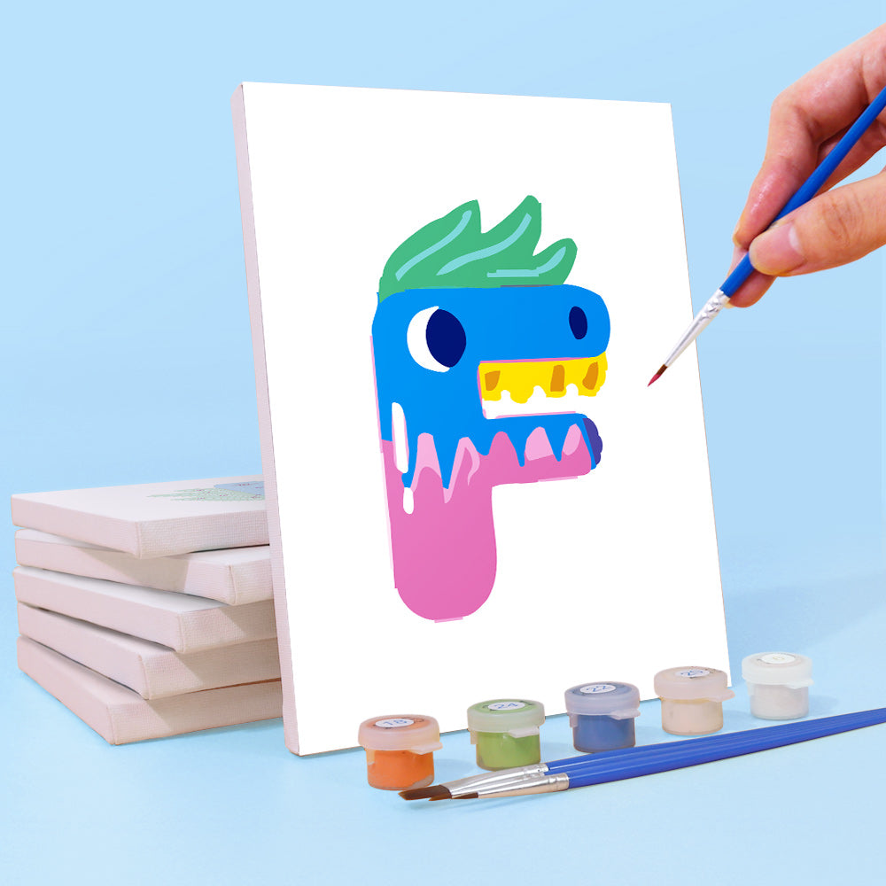 Peinture de monstre colorée sur un tableau blanc avec des fournitures de peinture et des pinceaux.