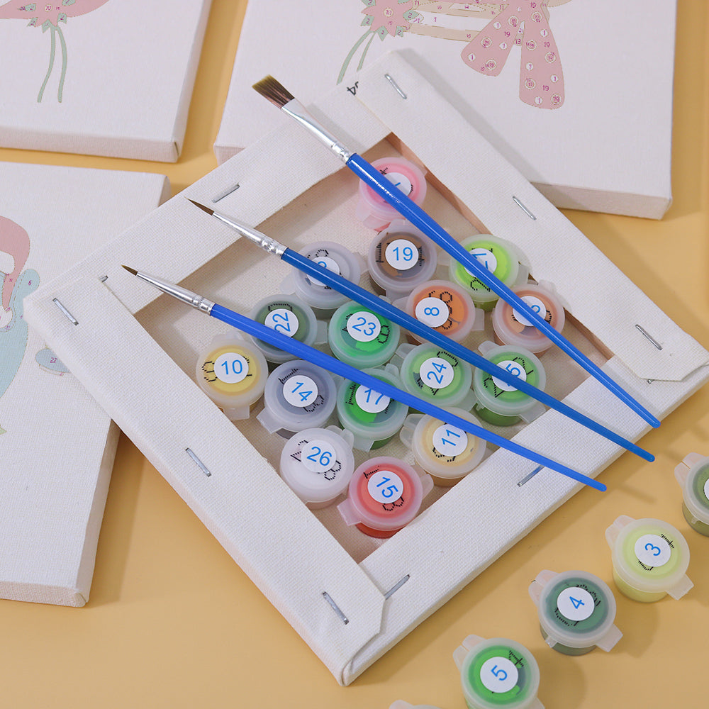 Holiday-themed paint by numbers kit with penguin wearing scarf