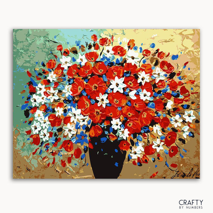 A paint by numbers kit depicting a bouquet of flowers with red, white, and blue petals in a black vase, with a textured gold background.