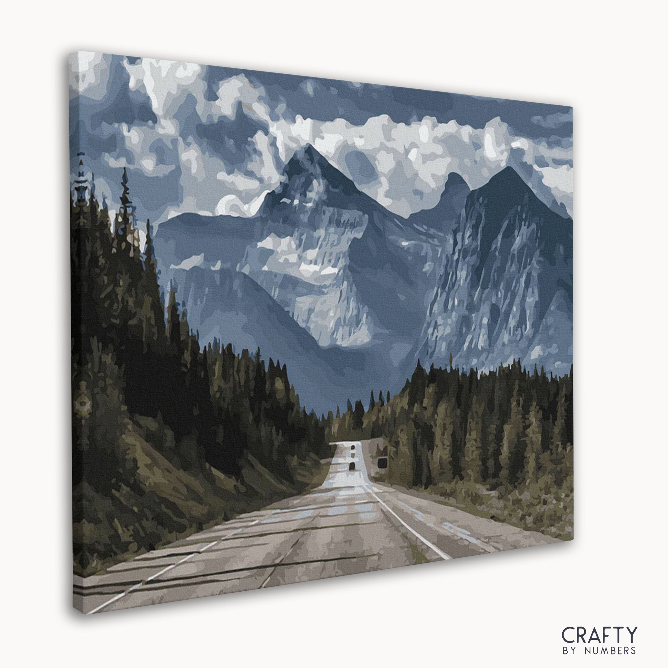 Close-up of numbered sections on a mountain road paint by numbers kit