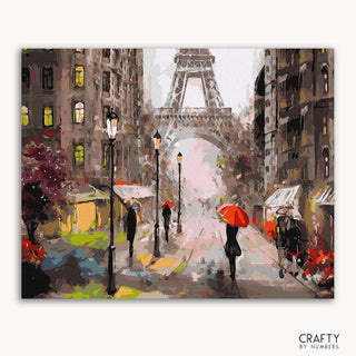 Un cuadro que representa una escena lluviosa en París con la Torre Eiffel al fondo, gente caminando con paraguas y un ambiente romántico en general.