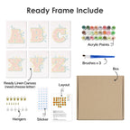 Product set with ready linen canvas, acrylic paints, brushes, and other items on a white background