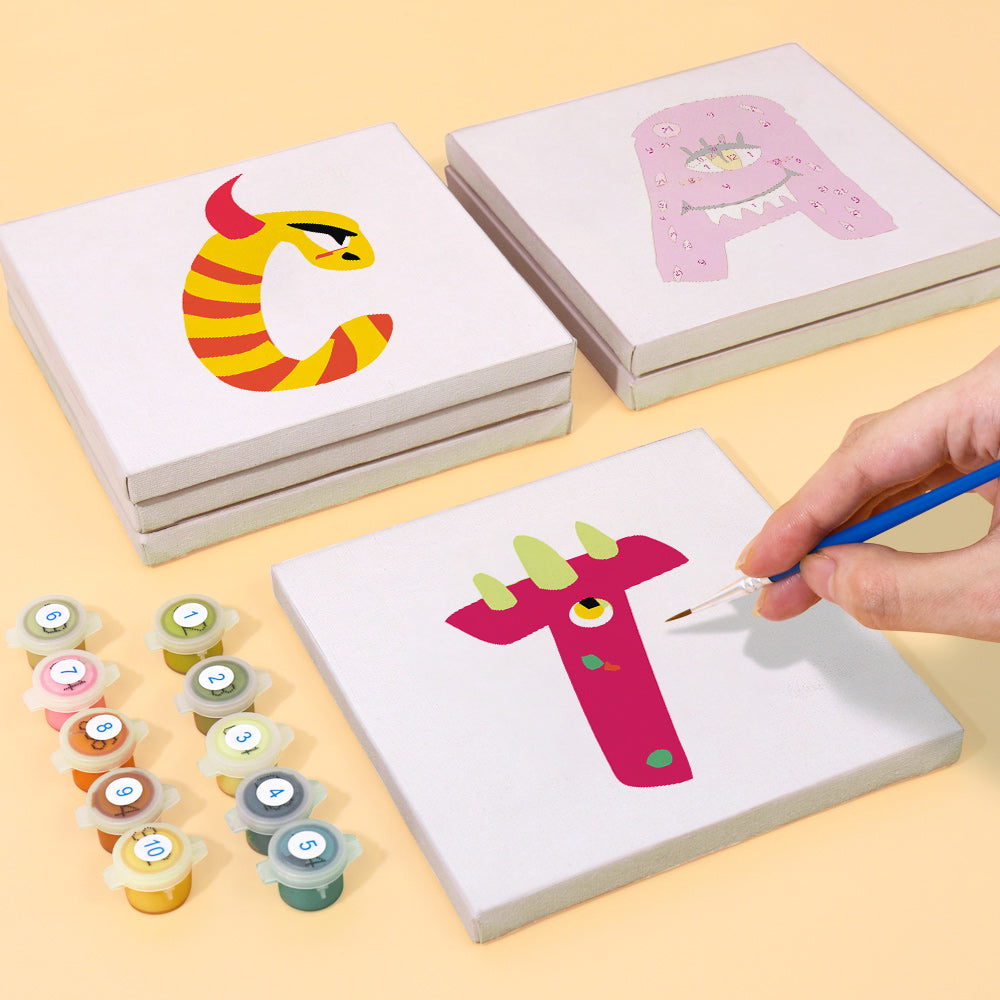 Children's art project with letter 'T' painting and color samples on a yellow background