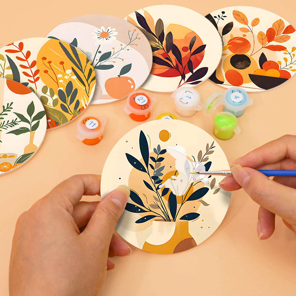Posavasos artísticos de elegancia terrosa que reflejan los 10 patrones de pinturas más famosas de Picasso y temas abstractos.