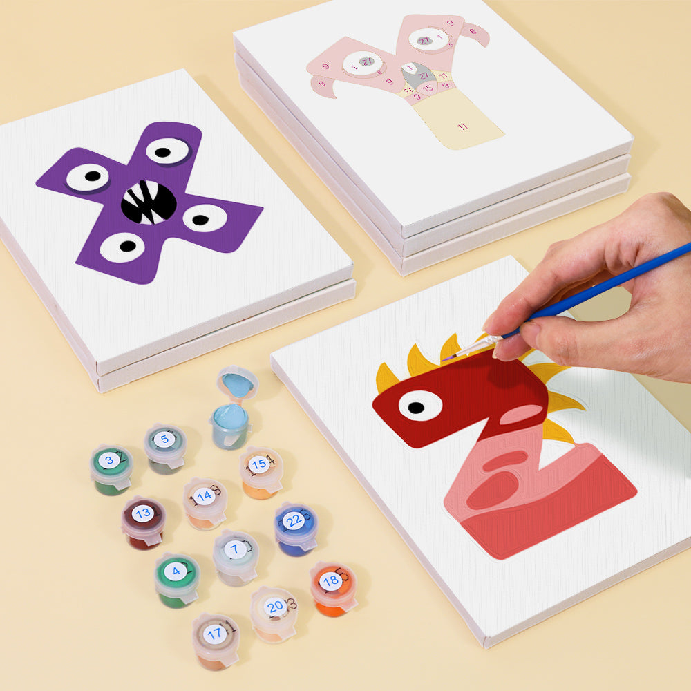 Children's art activity with paint and templates on a beige surface