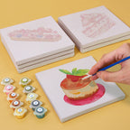 Assorted Baked with Love mini paint by numbers kits on a table