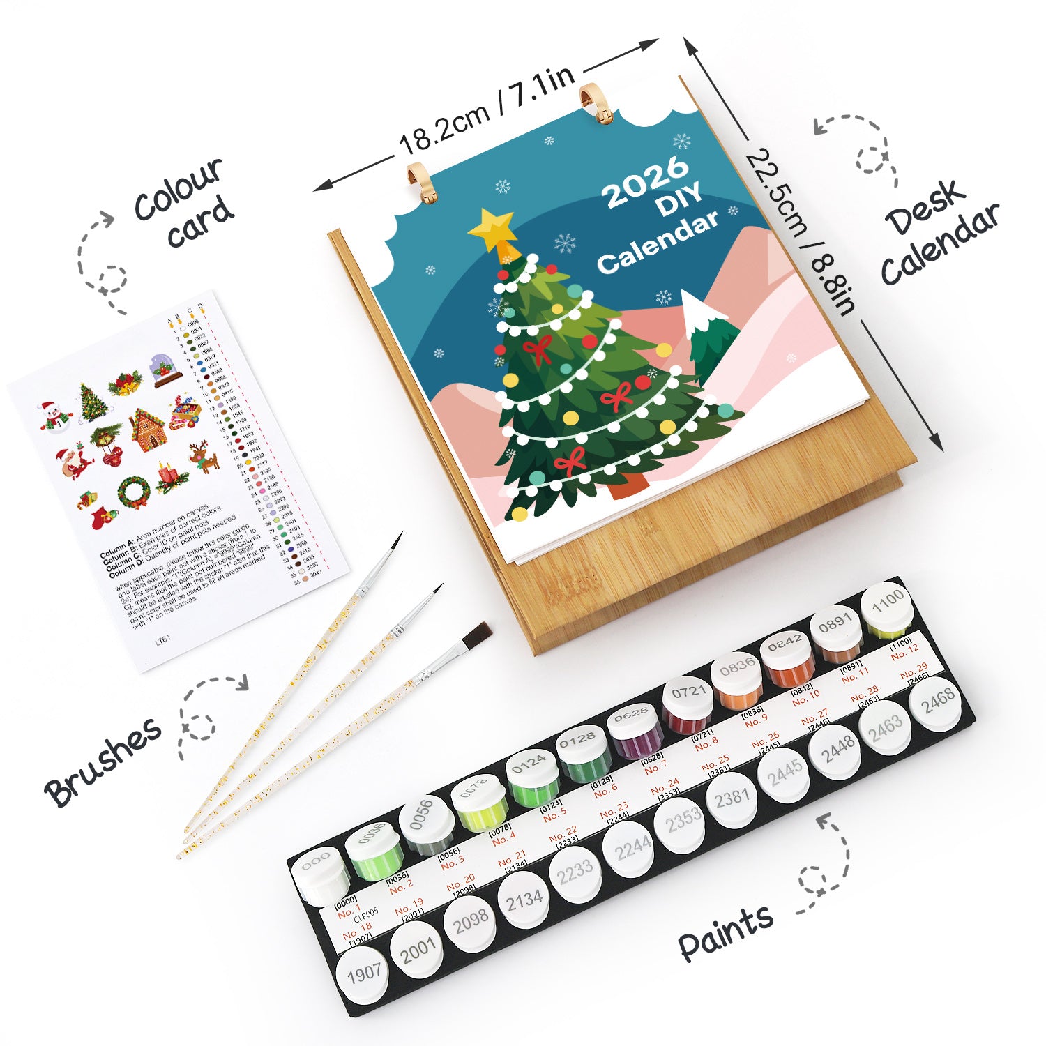 Conjunto de arte DIY con calendario, juego de pintura, pinceles y tarjeta de colores sobre un fondo blanco