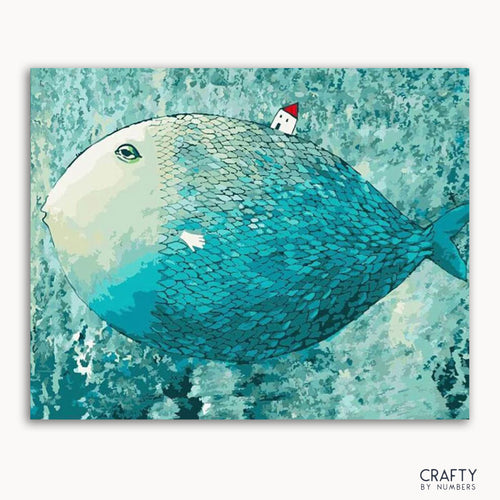 A paint-by-numbers kit image featuring a cartoon-style large fish with a smaller fish riding on its back, in shades of blue.