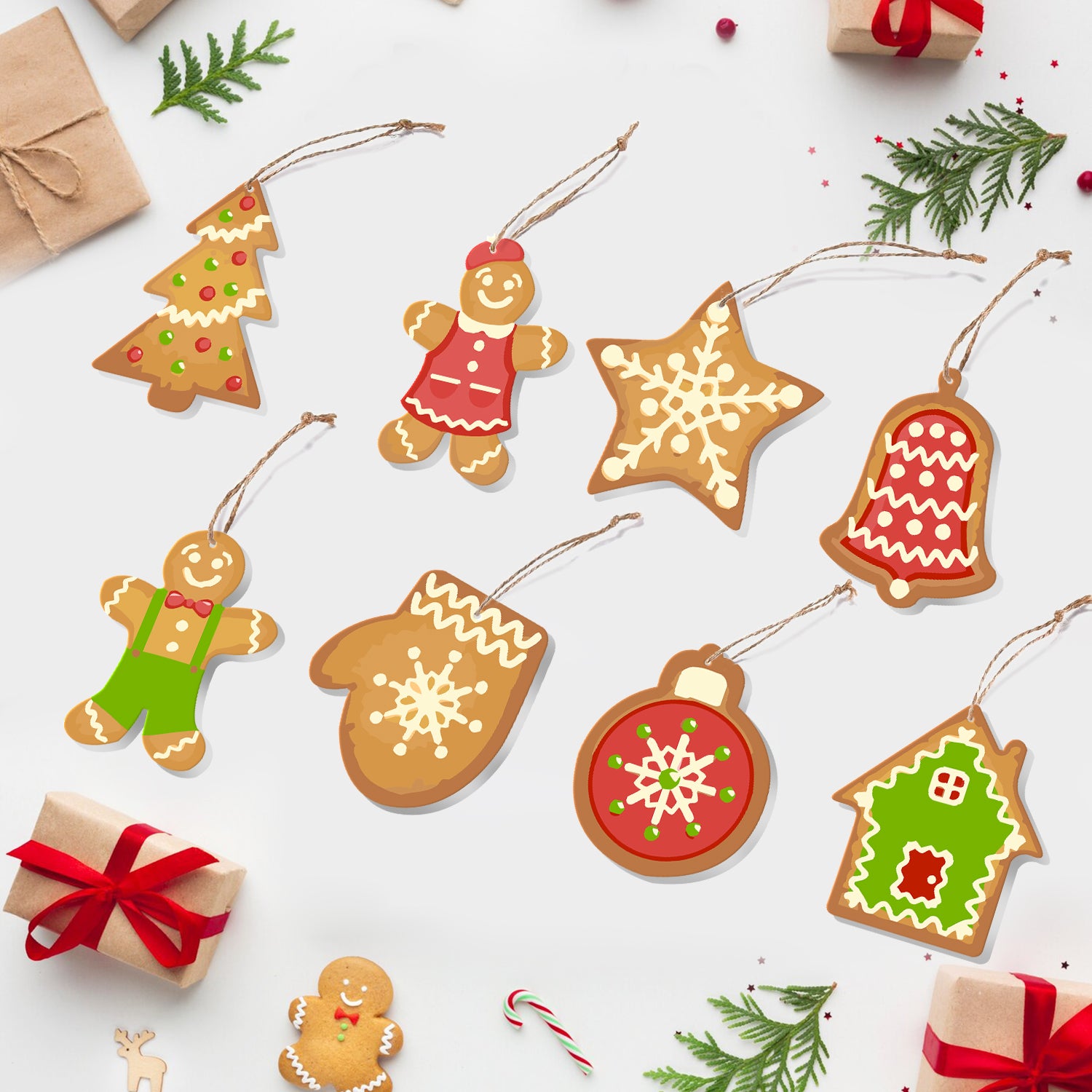 Ornements de Noël décoratifs en forme de biscuits en pain d'épice sur fond blanc avec de petites boîtes cadeaux et des cannes de bonbon.