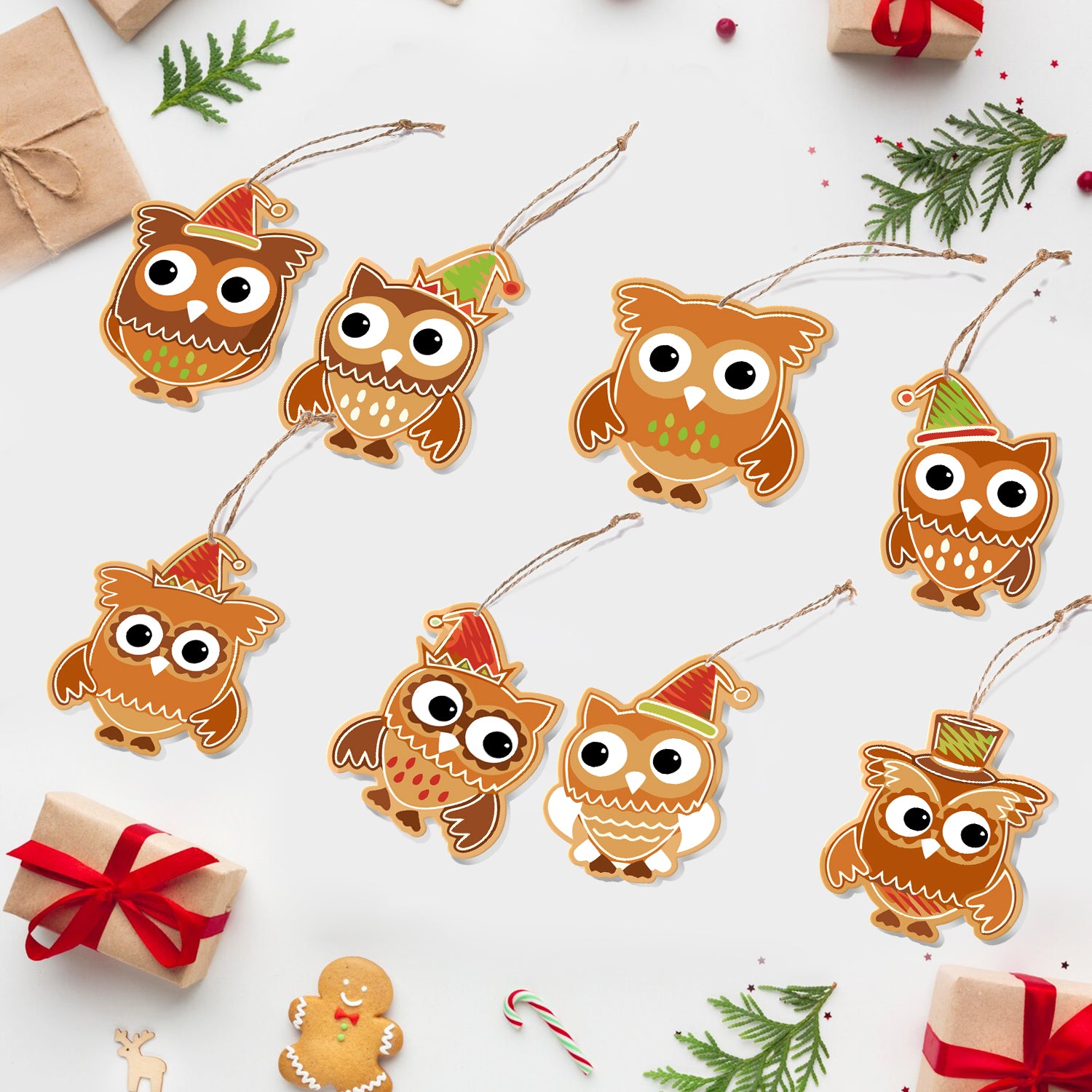 Decorative owl ornaments with Christmas hats on a white background with gift boxes and trees.