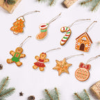 Set of Christmas-themed cookie ornaments on a white background with festive decorations.