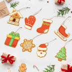 Collection of Christmas-themed cookie cutouts on a white background with small gift boxes and candy canes.