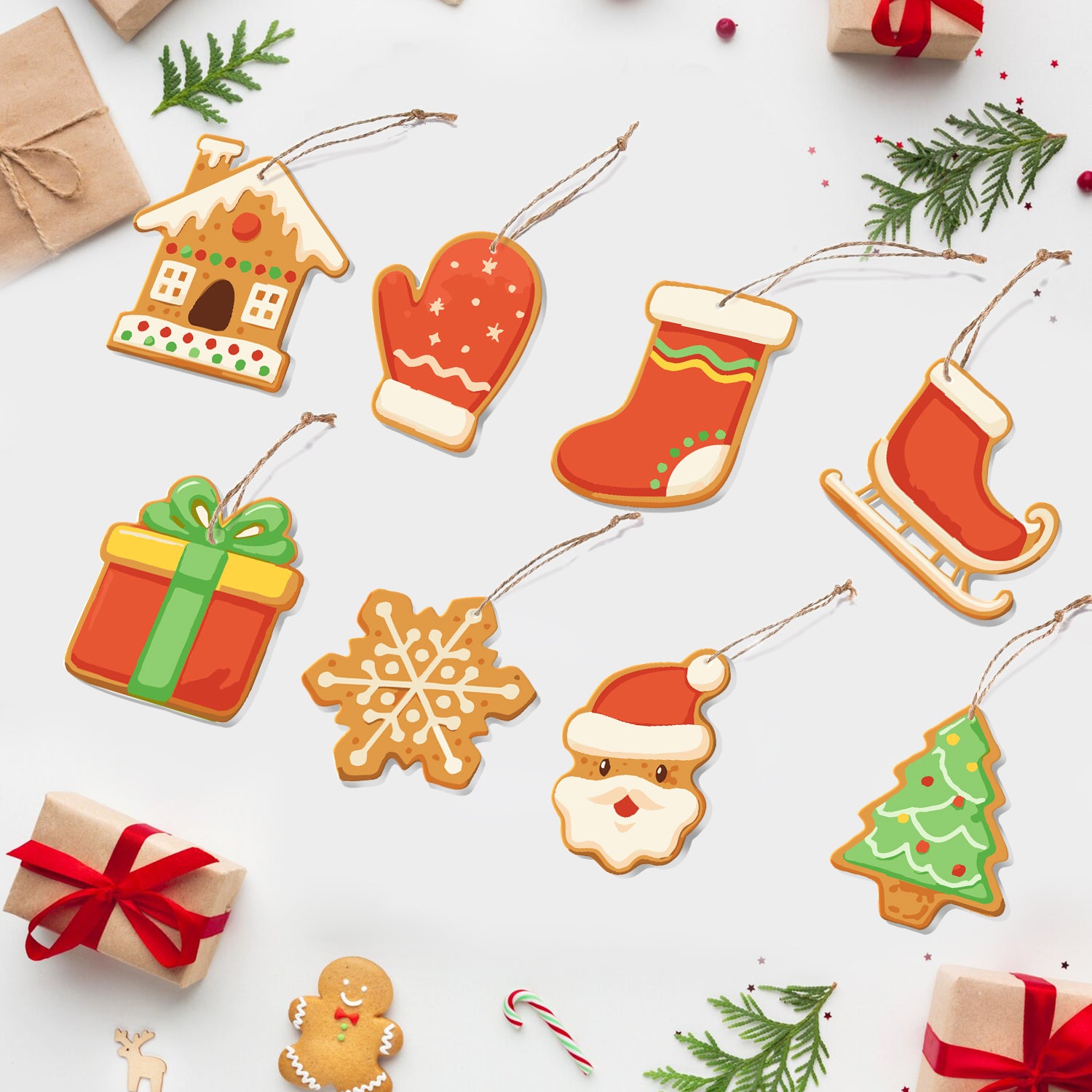 Collection of Christmas-themed cookie cutouts on a white background with small gift boxes and candy canes.