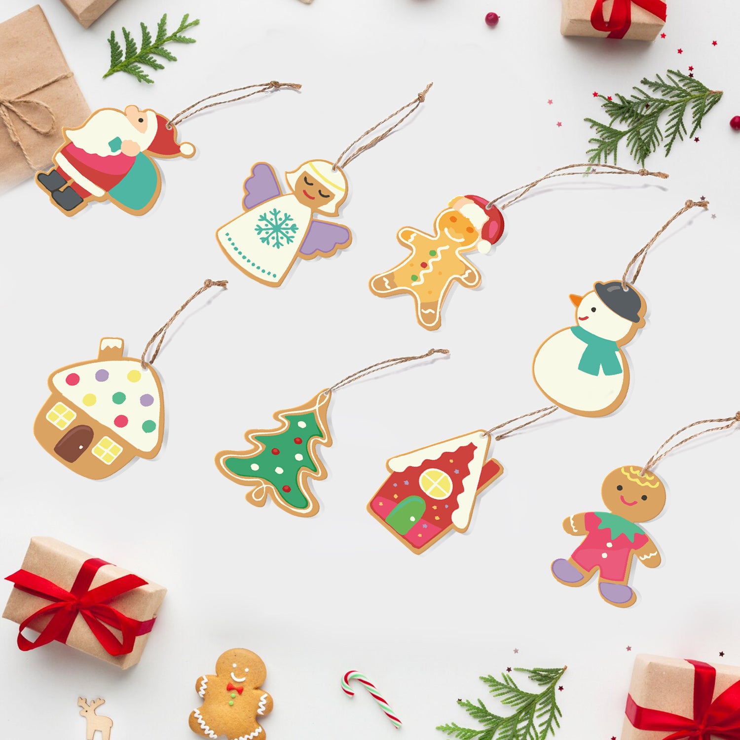 Coloridos adornos de papel con temática navideña sobre un fondo blanco con pequeñas cajas de regalo y bastones de caramelo.
