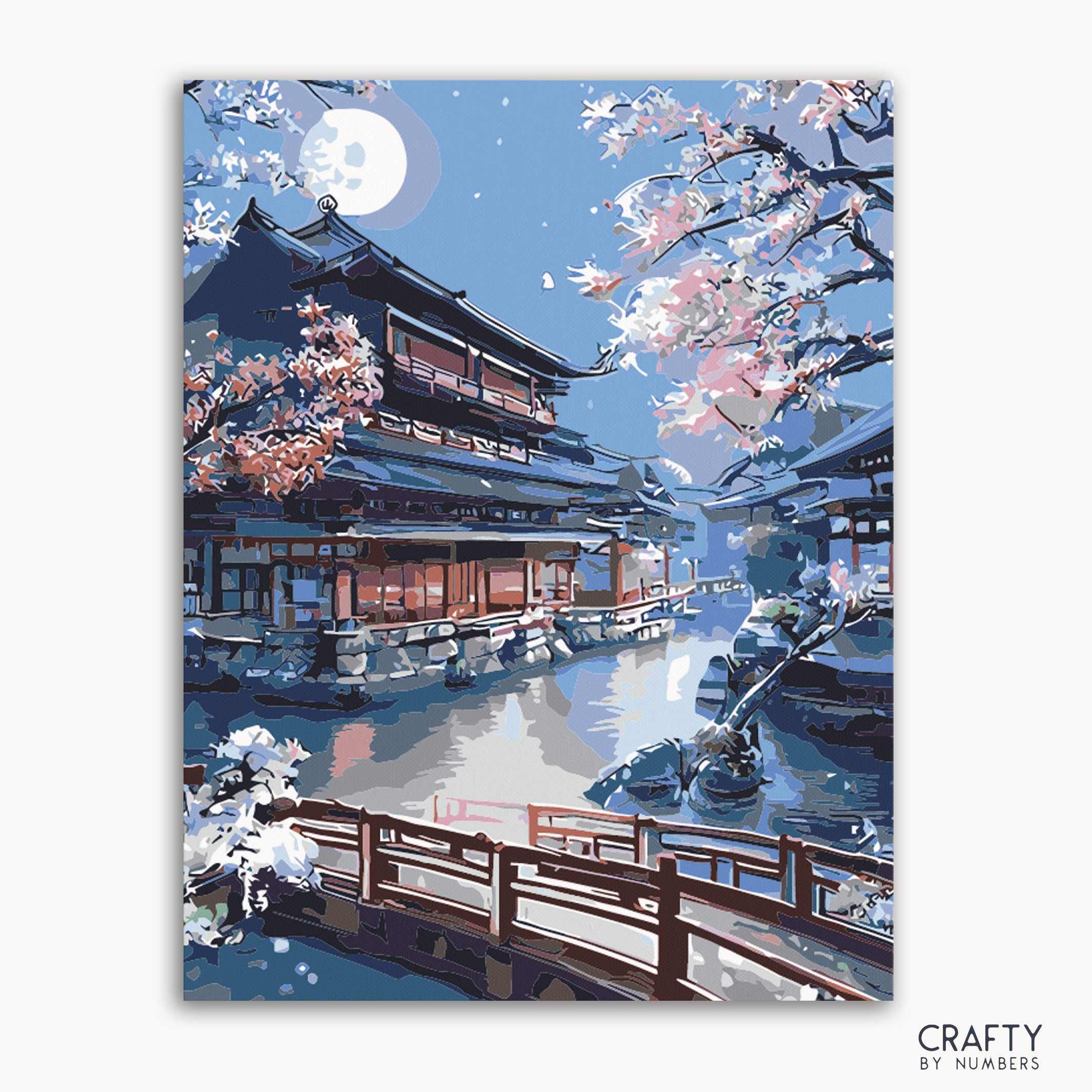 A paint by numbers kit depicting a Kyoto Shrine scene with a bridge, cherry blossoms, and a full moon.