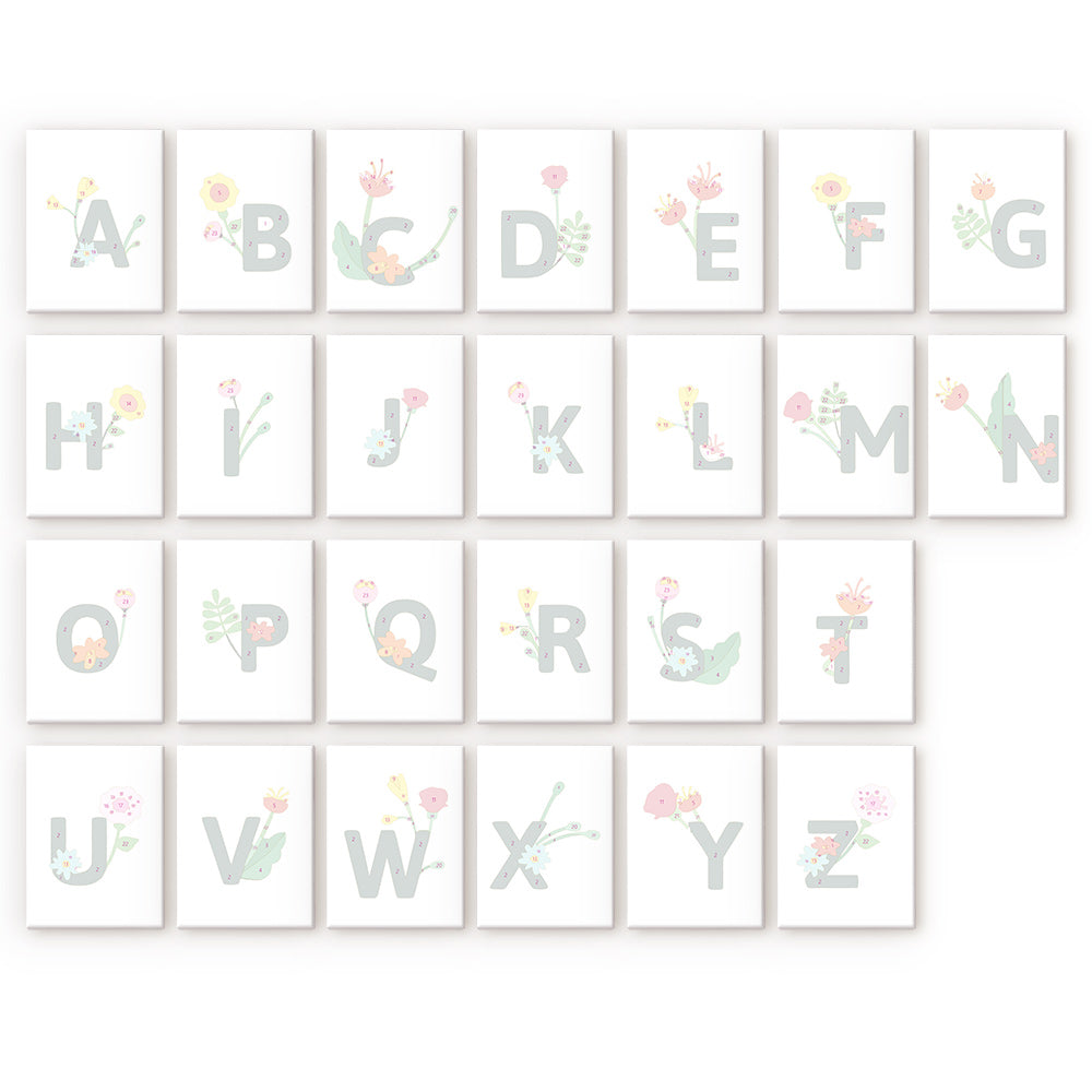 Alphabet letters with floral designs on a white background
