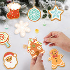 Decorative Christmas ornaments shaped like gingerbread cookies on a snowy background.