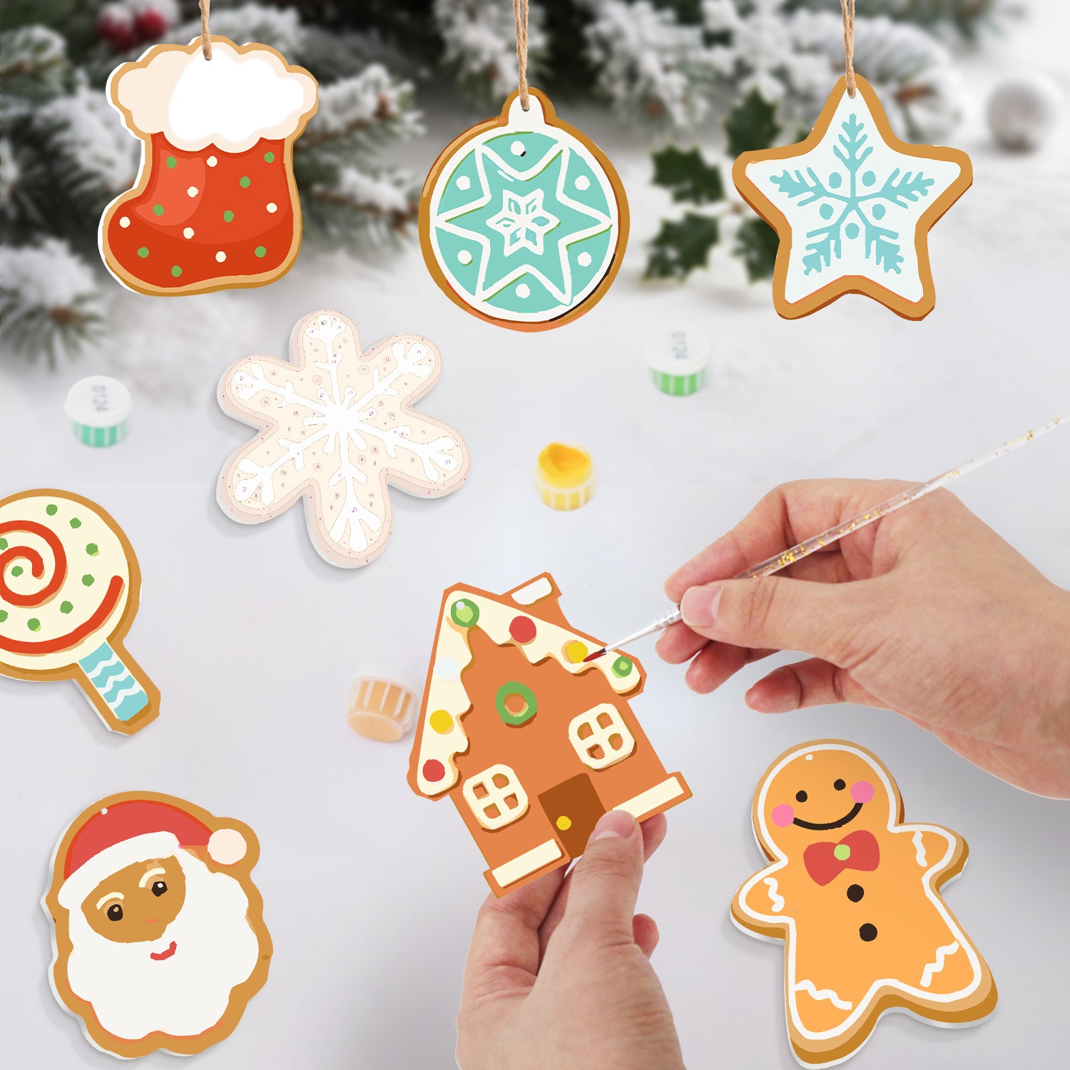 Decorative Christmas ornaments shaped like gingerbread cookies on a snowy background.