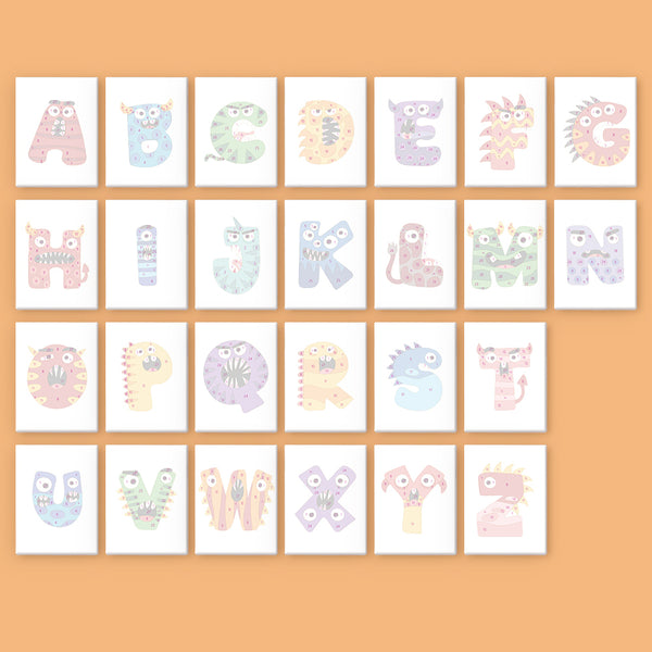 Alphabet cards with colorful animal-themed letters on a peach background