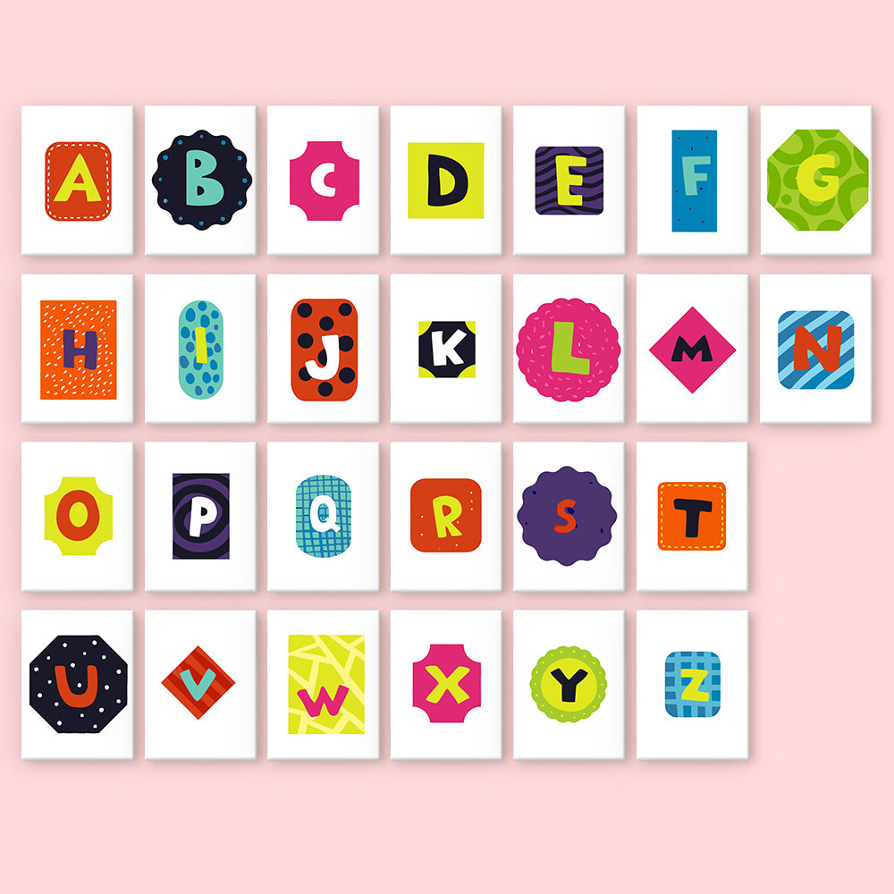Colorful alphabet letters on a pink background