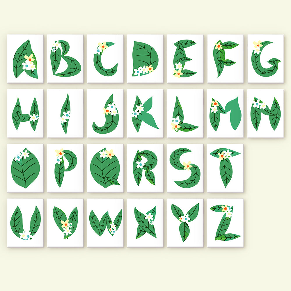 Alphabet letters with leaf designs on a beige background