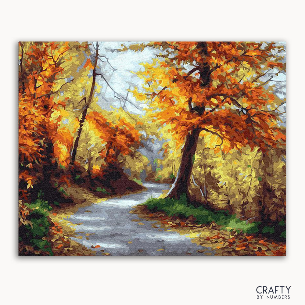 A painting of a forest road in autumn with vibrant orange and yellow leaves on the trees, titled 'Autumn Forest'.