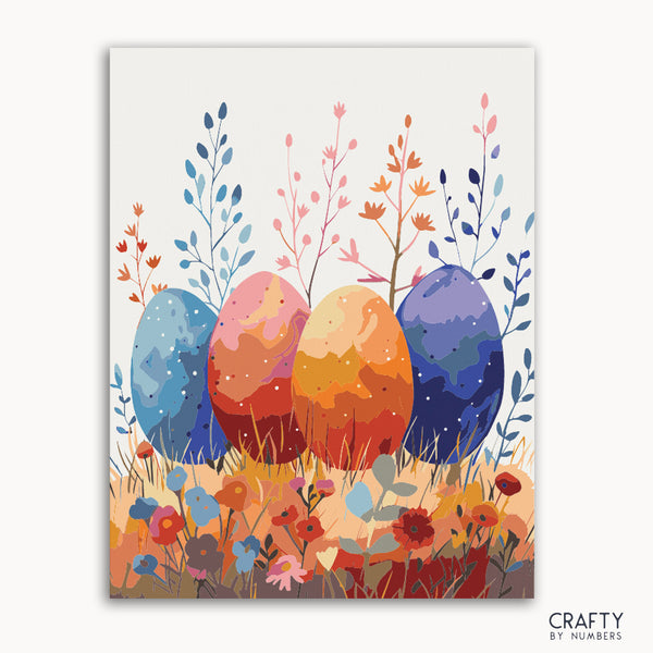 A paint by numbers kit with a design of colorful Easter eggs surrounded by floral elements against a white background.